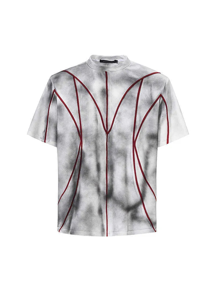 Padded shoulder short sleeve T-shirt with three-dimensional line patchwork detail on a mannequin.