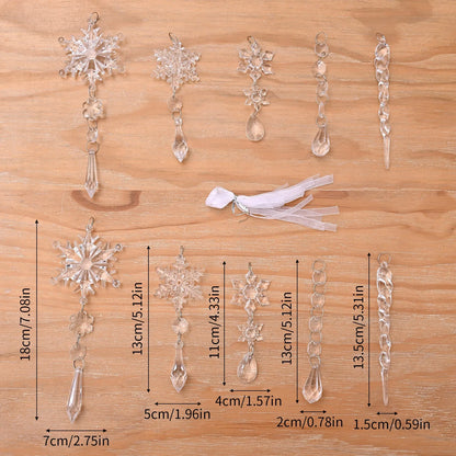 Ten clear acrylic icicle Christmas tree ornaments with hanging holes and white ribbon on pine branches