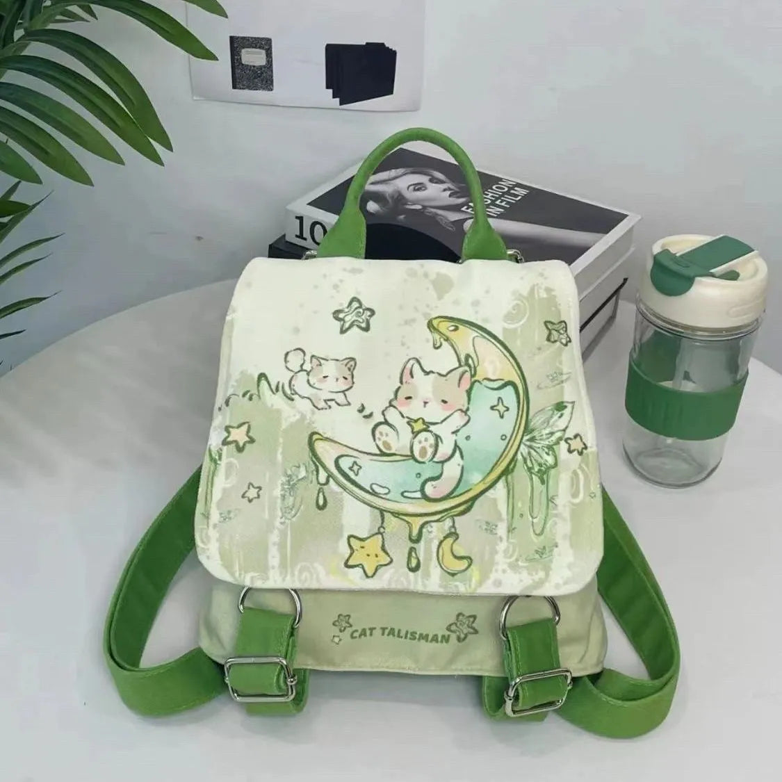 Mint green polyester backpack with sandwich pocket and canvas lining, 23x10x25cm