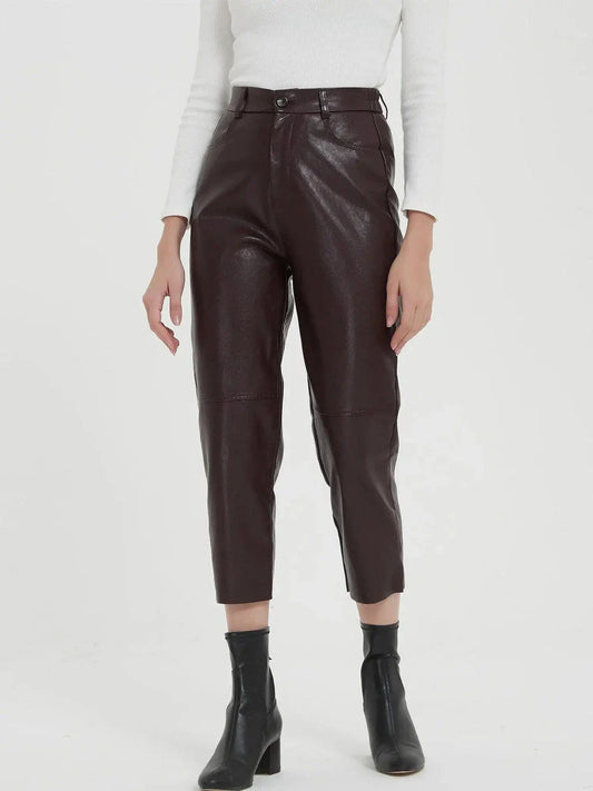 Elegant faux leather pants with high waist and ankle-length design, perfect for office or casual wear.