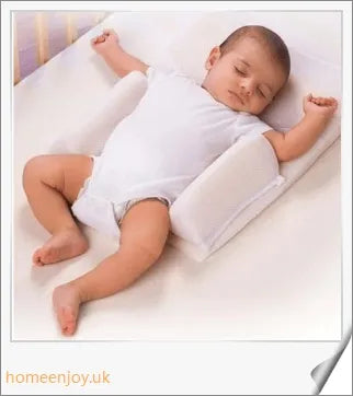 A premium baby sleep pillow with elevated head position, air vents, and breathable mesh fabric for comfortable, safe slumber.