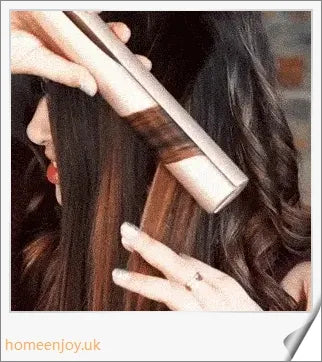 A sleek and versatile 2-in-1 hair straightening and curling iron with adjustable temperature settings