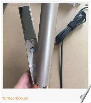 A sleek and versatile 2-in-1 hair straightening and curling iron with adjustable temperature settings