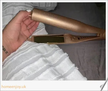 A sleek and versatile 2-in-1 hair straightening and curling iron with adjustable temperature settings
