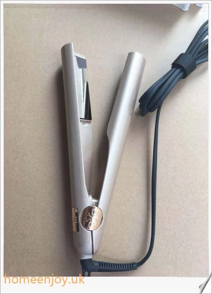 A sleek and versatile 2-in-1 hair straightening and curling iron with adjustable temperature settings
