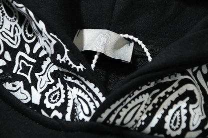 Full Printed Paisley Scroll Stitching Hoodie Sweater in Black, featuring a unique paisley print design and cosy fleece lining