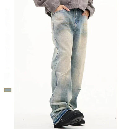 Loose, straight-leg jeans in a light blue, washed-out vintage style for men