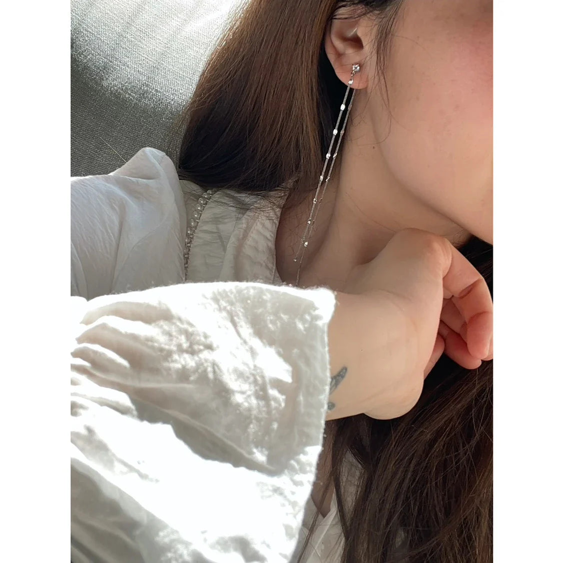 Elegant long tassel sequin earrings in silver, inspired by the Han Dynasty