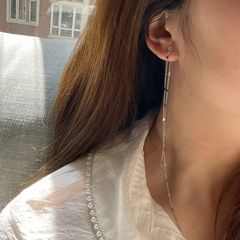 Elegant long tassel sequin earrings in silver, inspired by the Han Dynasty