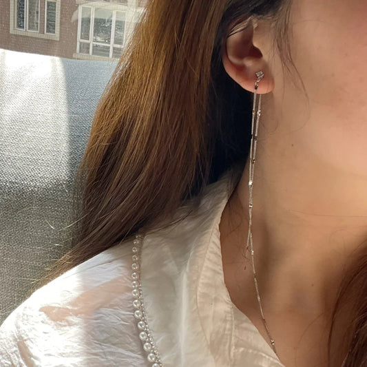 Elegant long tassel sequin earrings in silver, inspired by the Han Dynasty
