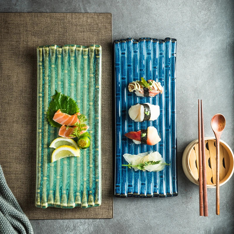 A rectangular ceramic plate with a beautiful kiln-baked blue finish, perfect for serving pizzas, cheese boards, and more.