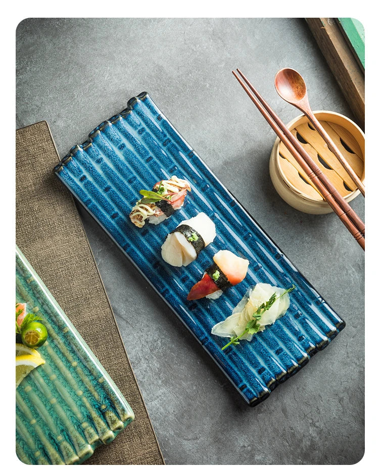 A rectangular ceramic plate with a beautiful kiln-baked blue finish, perfect for serving pizzas, cheese boards, and more.