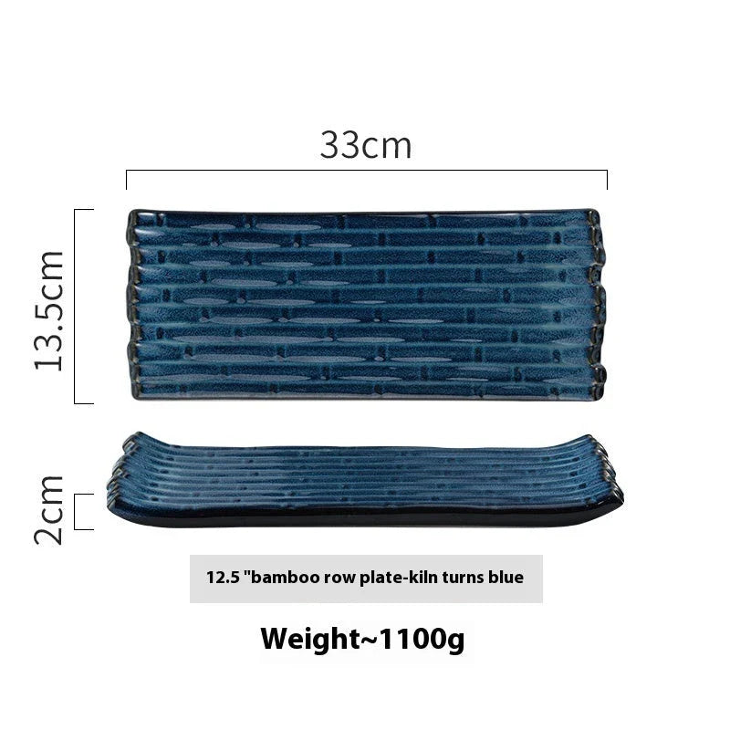 A rectangular ceramic plate with a beautiful kiln-baked blue finish, perfect for serving pizzas, cheese boards, and more.