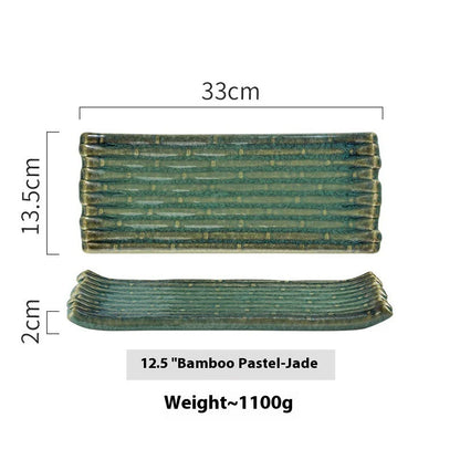 A rectangular ceramic plate with a beautiful kiln-baked blue finish, perfect for serving pizzas, cheese boards, and more.