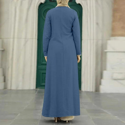 Muslim women's dress made of elegant ice silk fabric with long sleeves and high slit hem, available in various colours