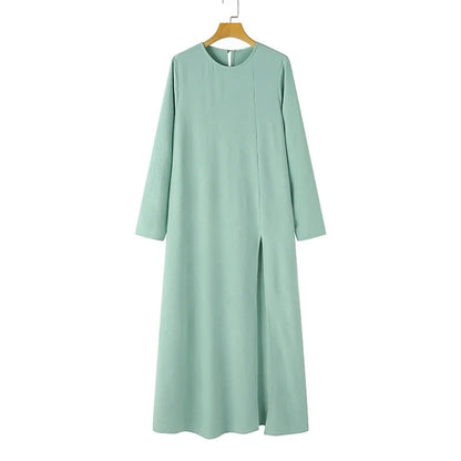 Muslim women's dress made of elegant ice silk fabric with long sleeves and high slit hem, available in various colours