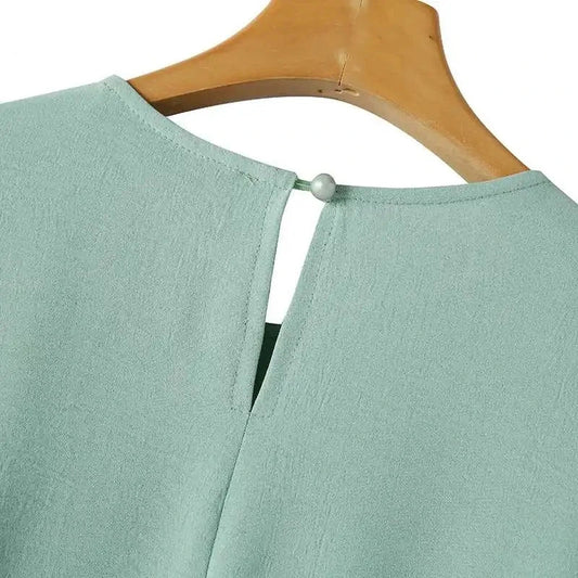 Muslim women's dress made of elegant ice silk fabric with long sleeves and high slit hem, available in various colours