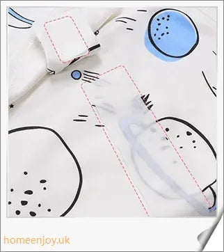 A cozy, snug baby swaddle with soft cotton fabric and velcro closures to provide comfort and security for newborns.