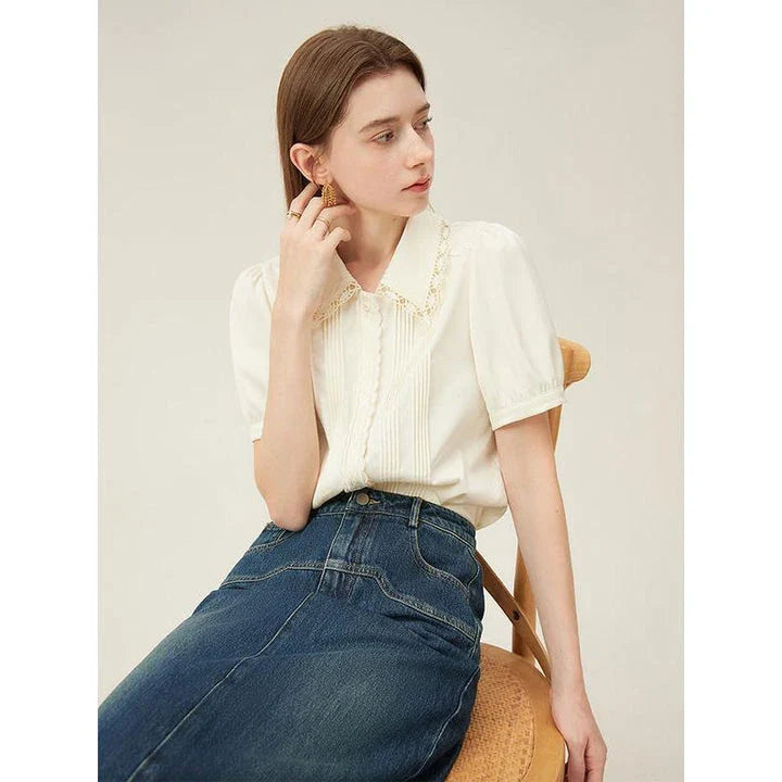Elegant summer embroidered polo-neck blouse with petal sleeves in ivory colour