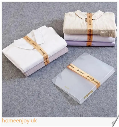 Dress Book - a space-saving clothes folder organizer that helps tidy up your wardrobe and prevent wrinkles in your luggage