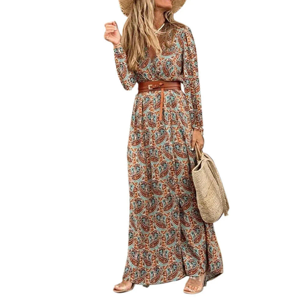 Long Sleeve V-neck Bohemian Floral Dress in Dark Blue with a flowing, mid-length skirt and vibrant floral patterns