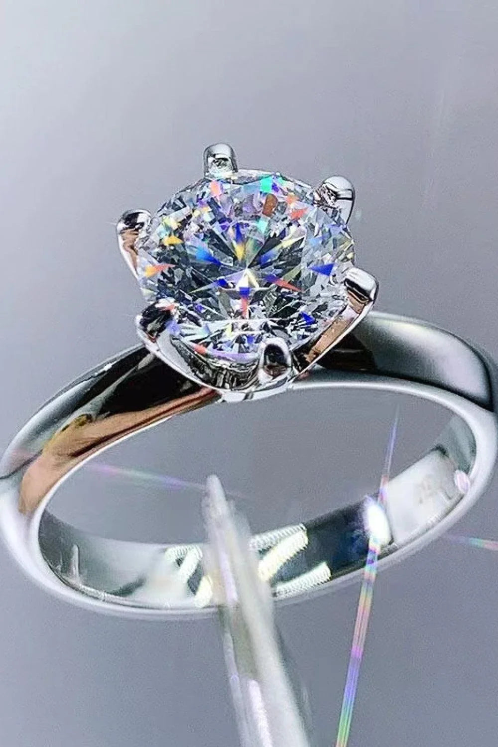 Premium 925 sterling silver ring featuring a captivating 3 carat moissanite centre stone in a classic 6-prong setting
