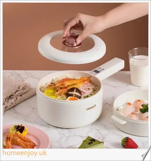 A sleek and stylish 700W electric ceramic liner cooking pot with adjustable temperature settings and a generous 1.6L capacity