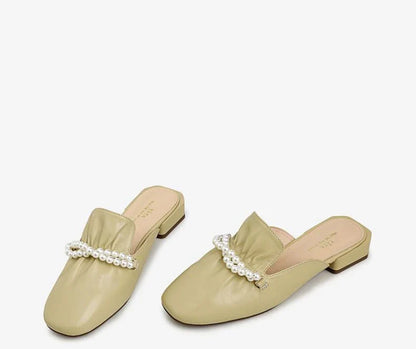Premium cow leather slippers with square-shaped toe and pearl decorations, designed for comfortable and stylish everyday wear