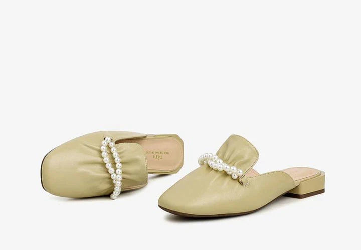 Premium cow leather slippers with square-shaped toe and pearl decorations, designed for comfortable and stylish everyday wear