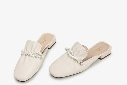 Premium cow leather slippers with square-shaped toe and pearl decorations, designed for comfortable and stylish everyday wear