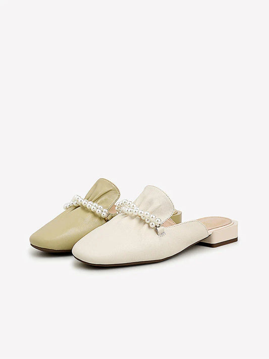 Premium cow leather slippers with square-shaped toe and pearl decorations, designed for comfortable and stylish everyday wear