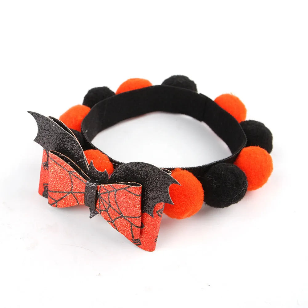 Halloween pet collar with fur ball decoration in pumpkin design