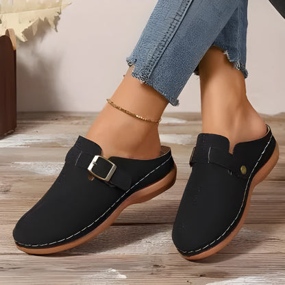 Women's casual wedge slippers in cloth with a rubber sole, shown in light brown colour.