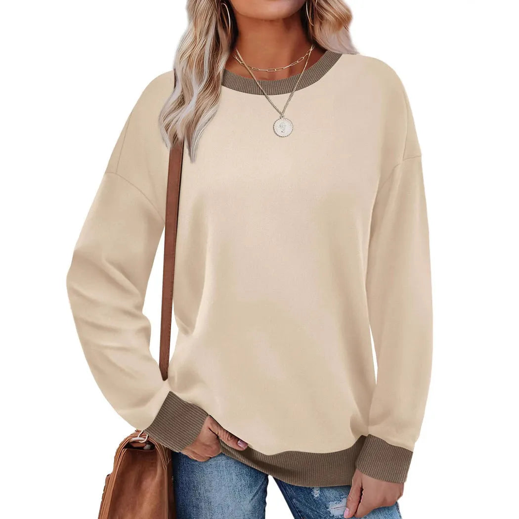 Loose fit striped long sleeve top for women on a hanger, shown in apricot colour.