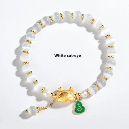 Natural agate and crystal bracelet with 8mm diamond-cut beads on a wrist.