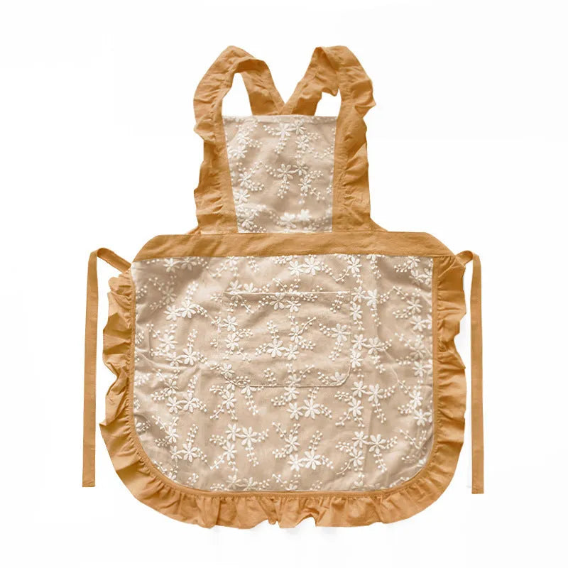 Cotton linen kitchen apron with lace-trimmed X straps in solid colour