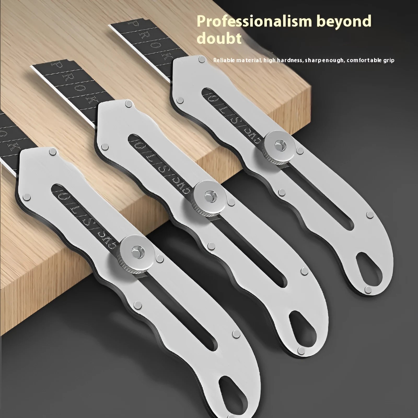 Stainless steel folding art knife with black blade and replacement blades
