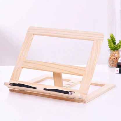 Large wooden reading book easel in pine with iron clamp, 31x24 cm, holding an open book on a desk
