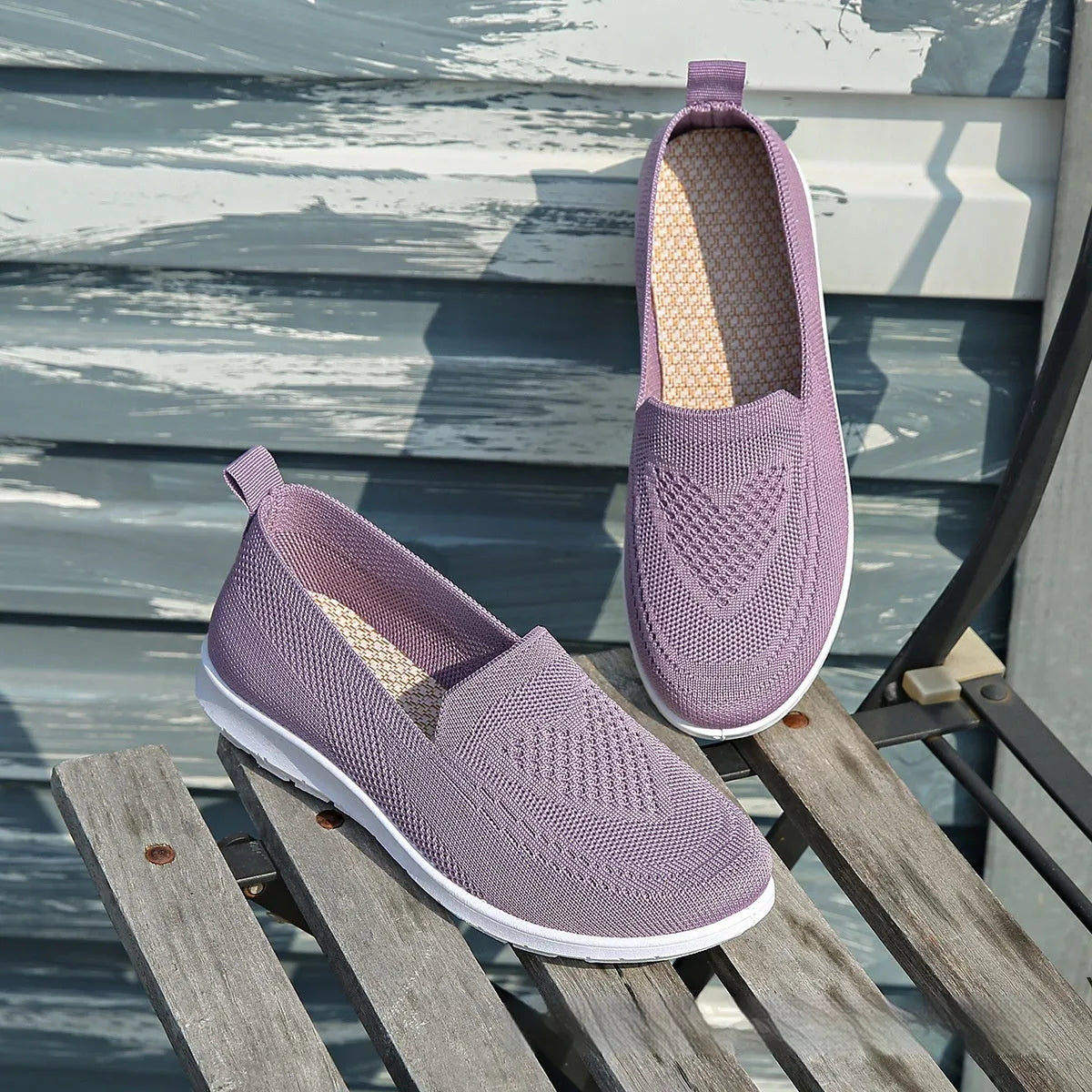 Plus size women's beige casual cloth shoes with low top, flat heel, and heart pattern.