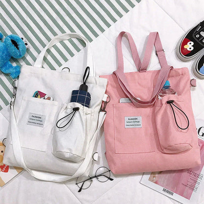 Stylish Harajuku-inspired canvas backpack with pockets, available in a variety of vibrant colors