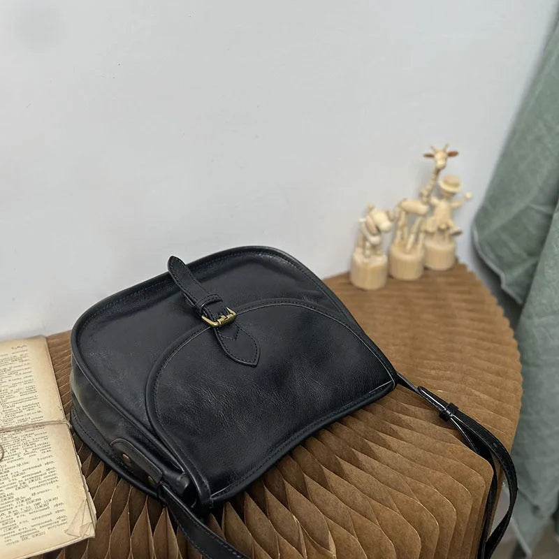Genuine leather retro messenger bag with crossbody strap and flap closure in coffee colour
