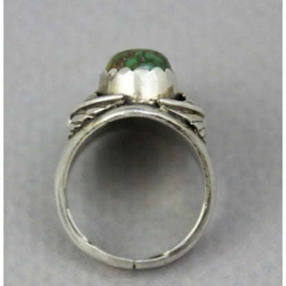 Turquoise geometric women's ring with inlaid detailing on alloy band, showing electroplated finish and structured design