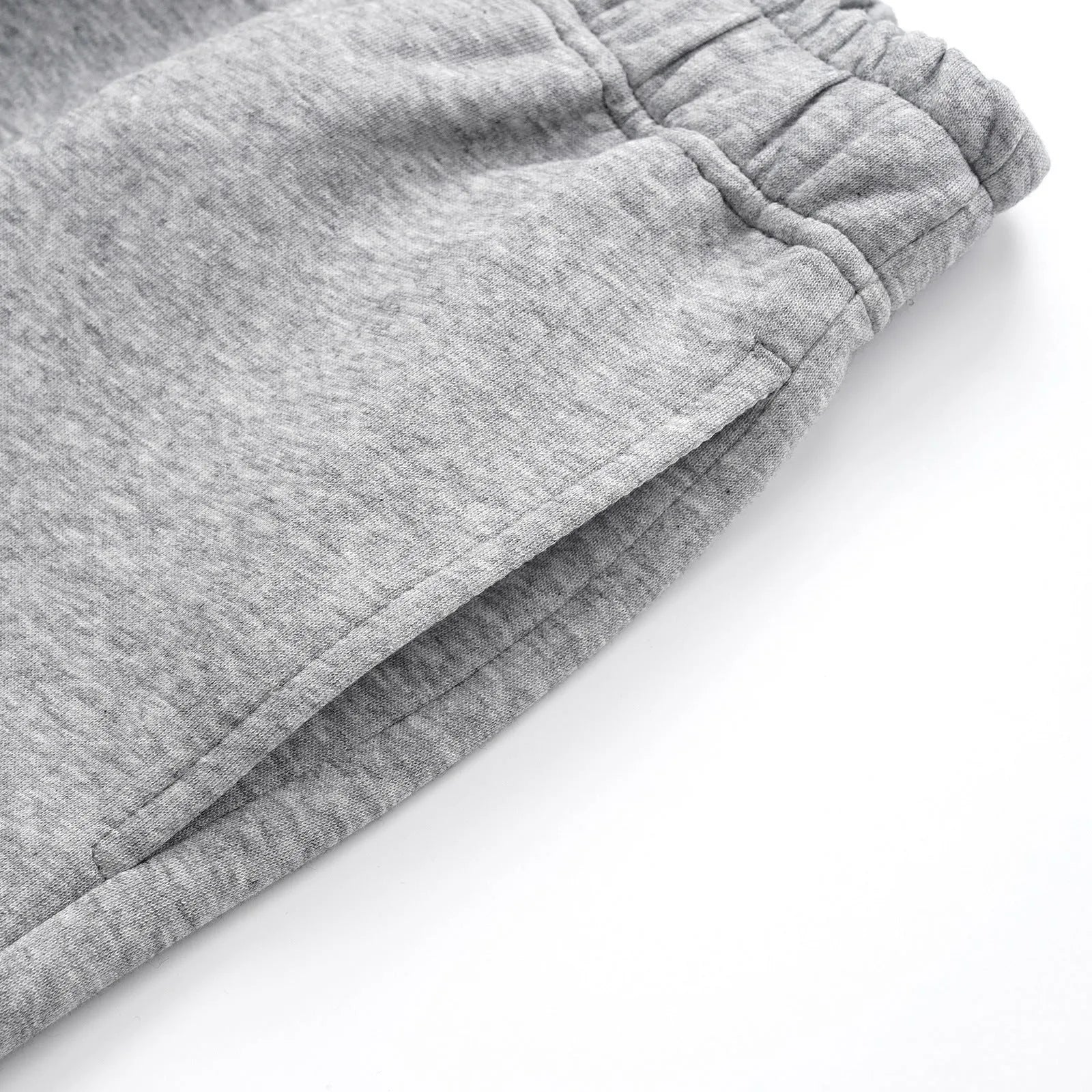 Men's solid colour cotton straight-leg loose casual trousers in grey and black.