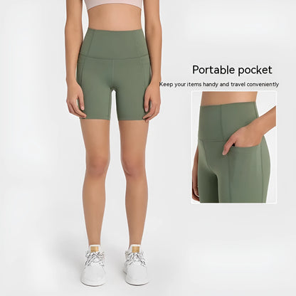 Women's tight-fitting cotton blend sports shorts in black, showing super stretch function and fifth pants length.