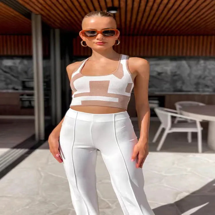 Women's white U-neck slim fit camisole vest with a crop hem, on a mannequin.