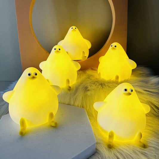 Adorable silicone seagull night light with soft glow, perfect for kids' rooms and bedtime.