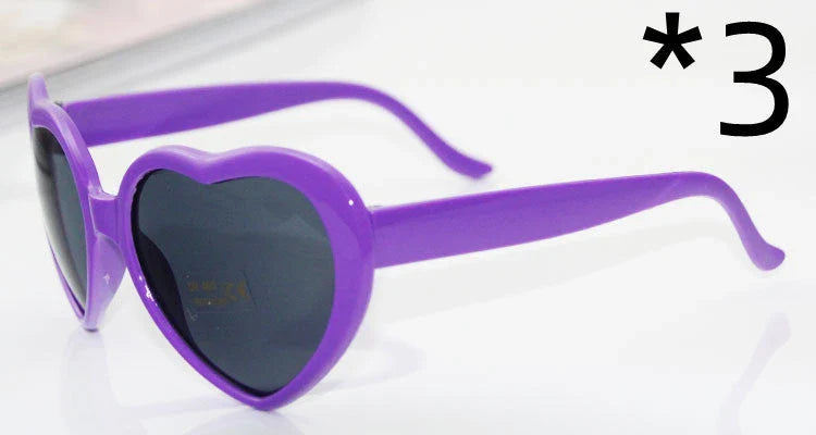 Fashionable heart-shaped light-up glasses with a built-in LED lighting system, perfect for adding a touch of love and playfulness to any occasion.