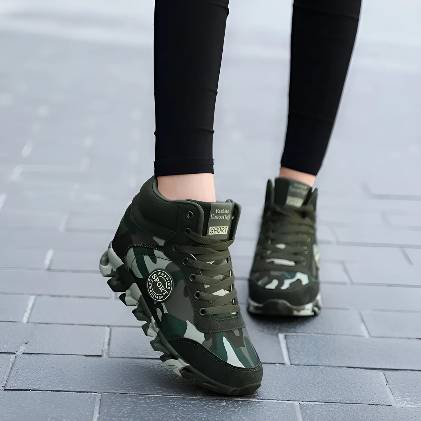 Green women's camouflage pattern canvas slip-on sneaker with a rubber sole.