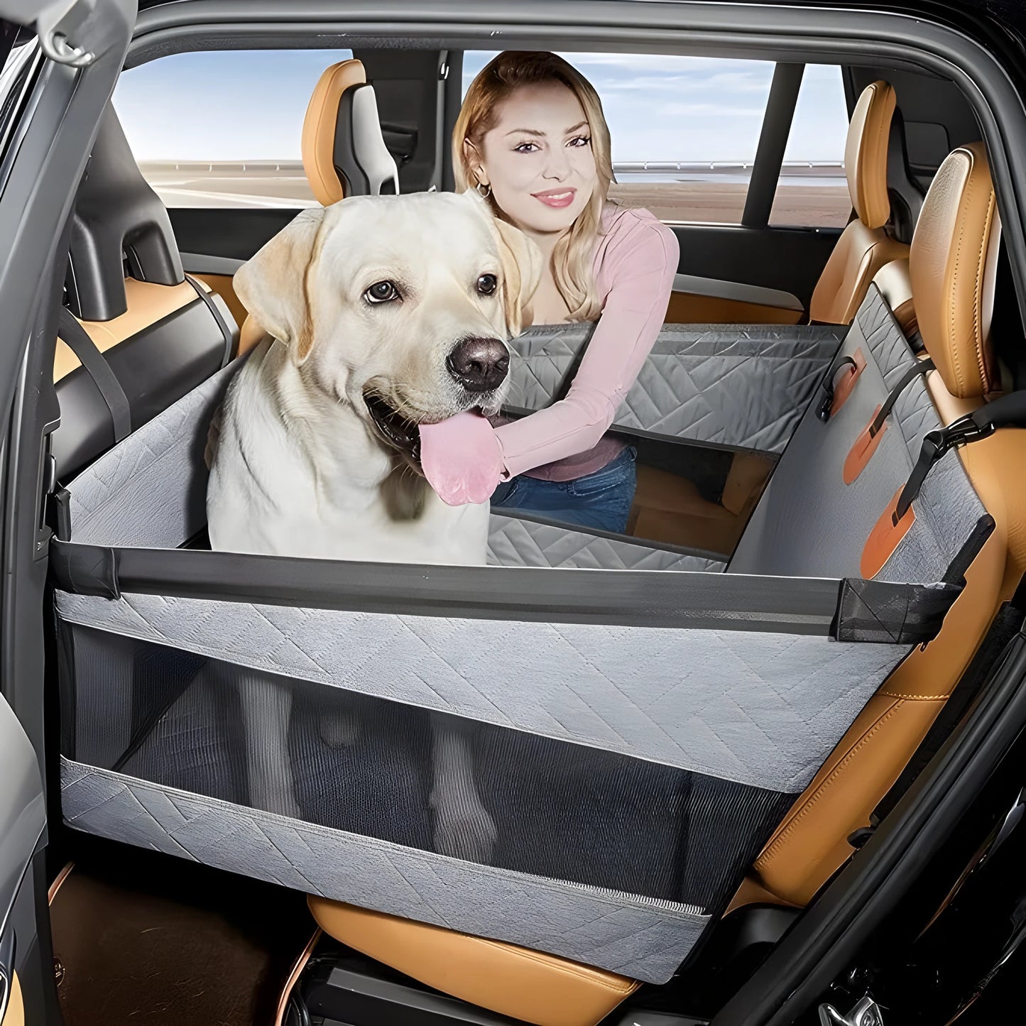 Grey water resistant rectangular dog bed with raised sides on a car back seat.