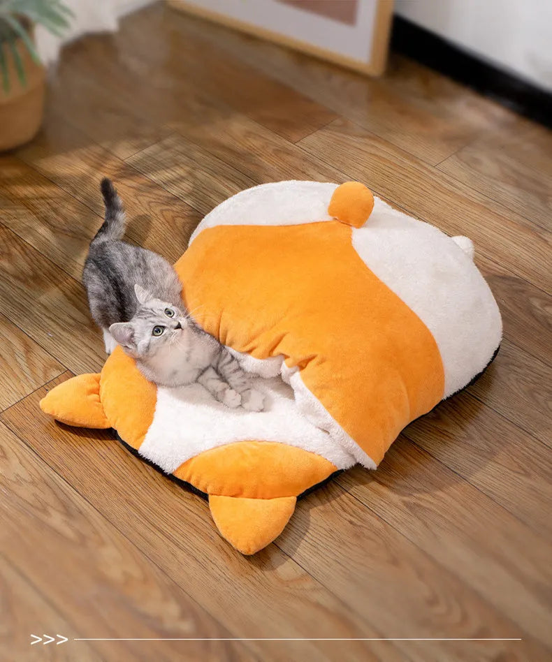 Orange fleece interior of a semi-closed cat sleeping bag measuring 65cm by 53cm.